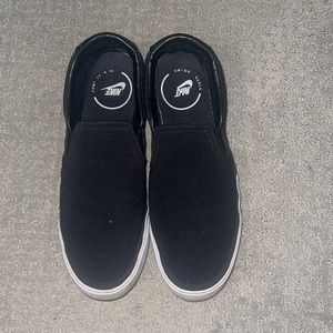 Black Nike canvas slip on. Size women 10.5.
